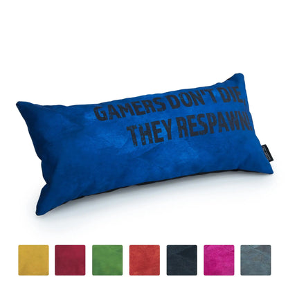 A blue rectangular pillow with the message "GAMERS DON'T DIE, THEY RESPAWN" written on it in white letters.