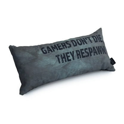A rectangular pillow with the text "GAMERS DON'T DIE THEY RESPAWN" written on it in black letters. 