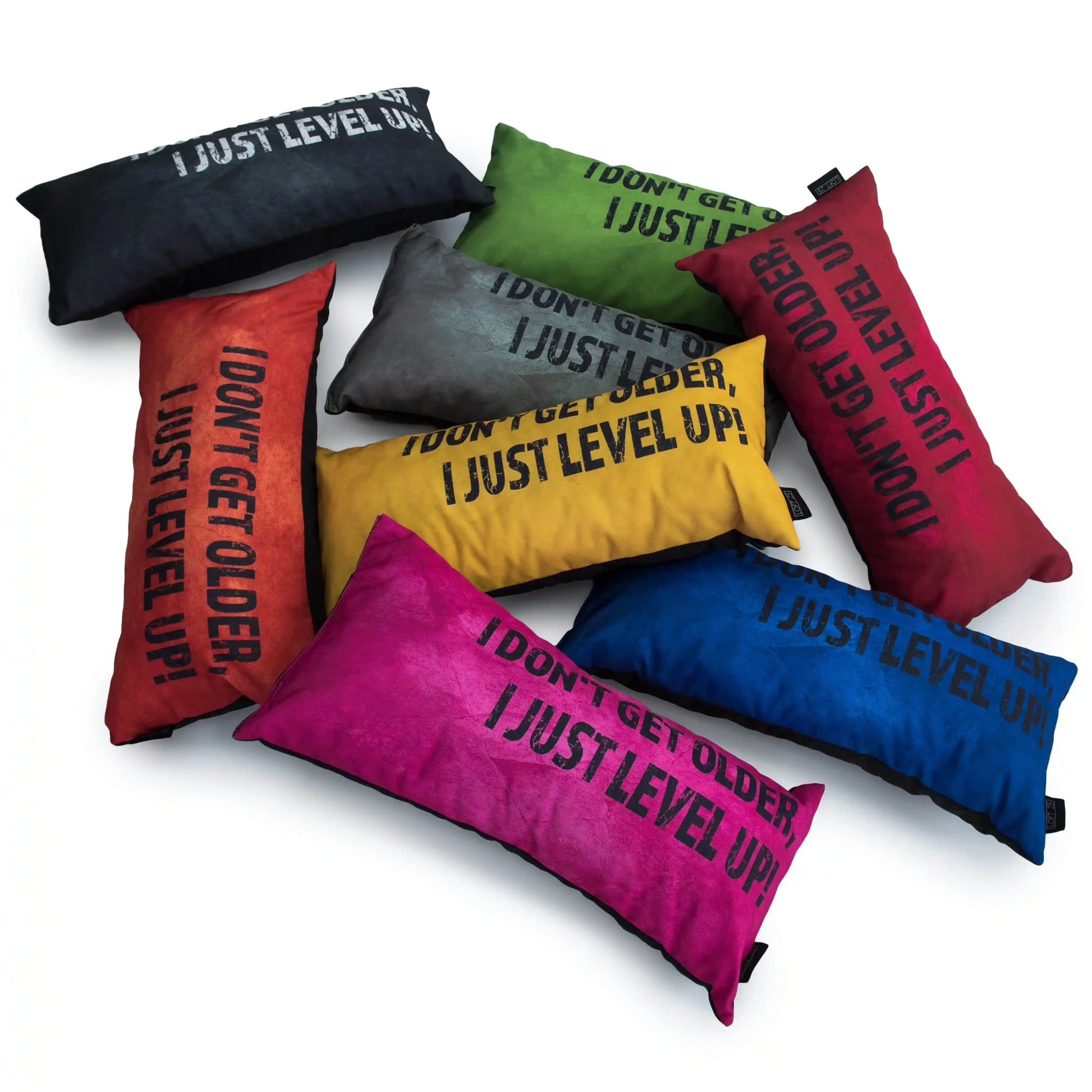 A group of colorful pillows with funny sayings on them.