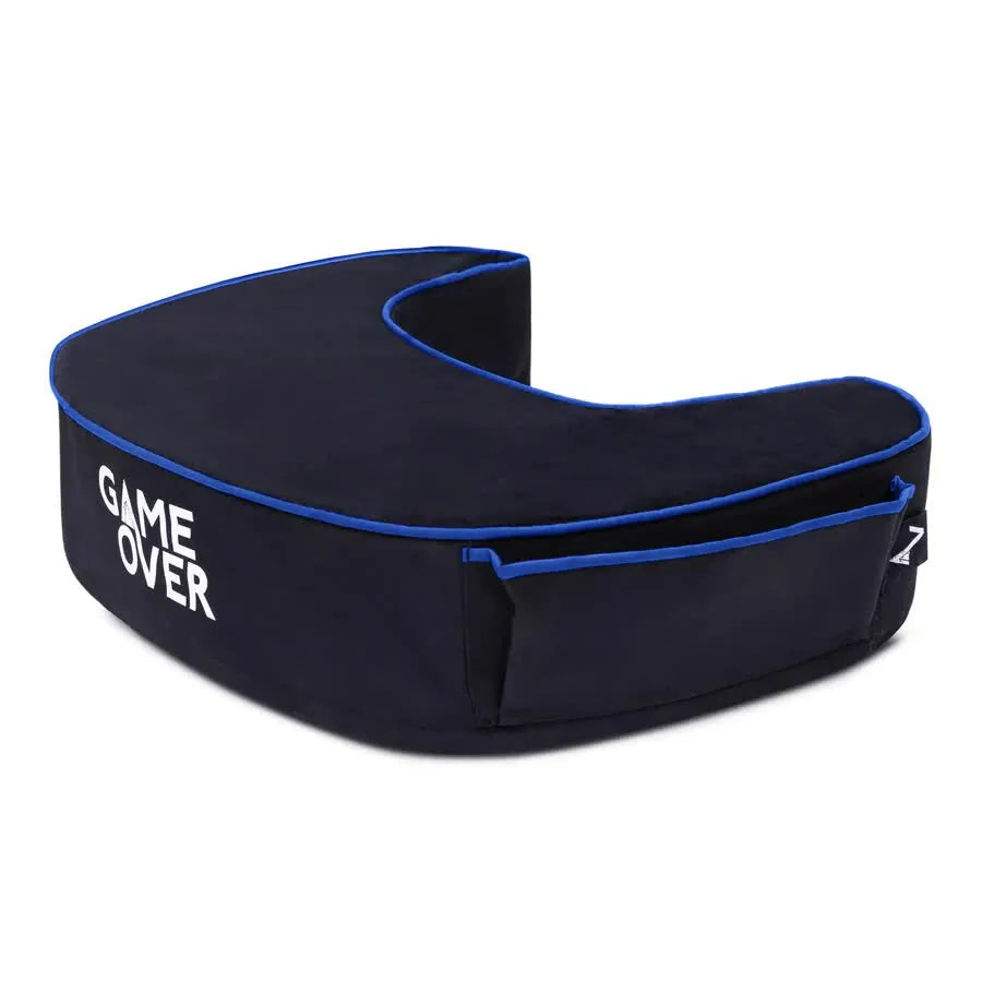 A black and blue pillow with the text "GAME OVER" in white font.